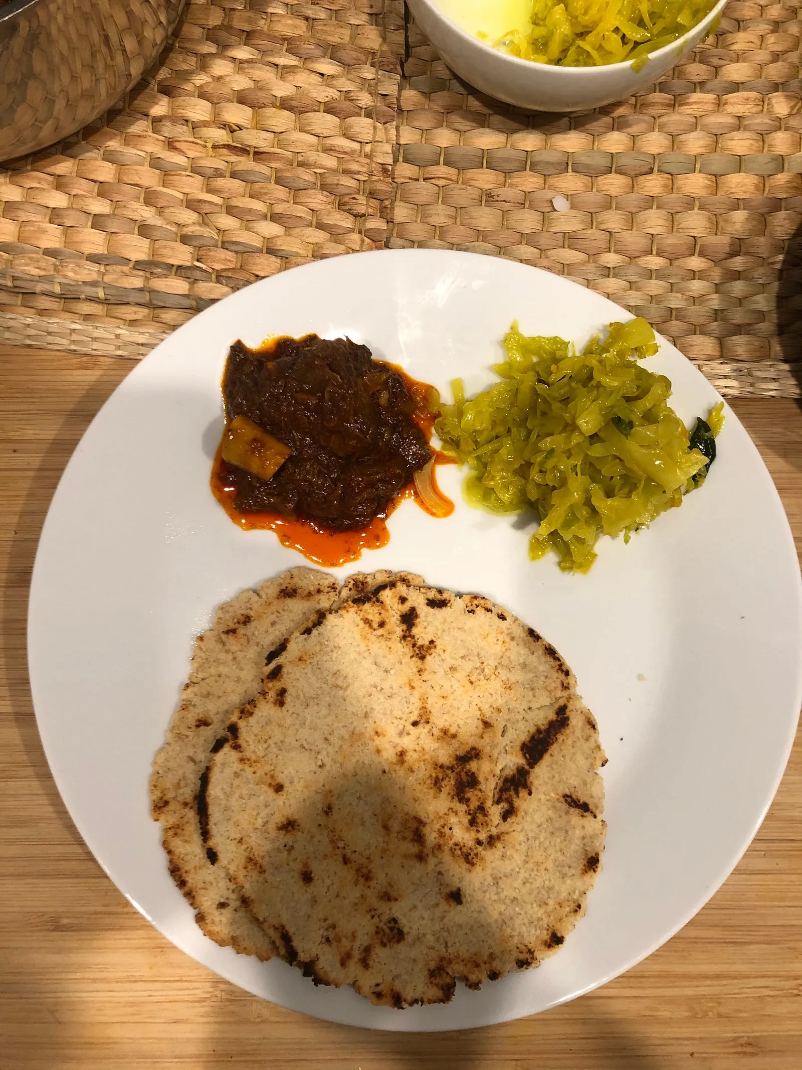 Almond flour roti, cabbage curry and mutton curry.